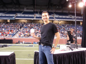 Sam Barros giving a presentation to 10,000+ people at Ford Field in Detroit.